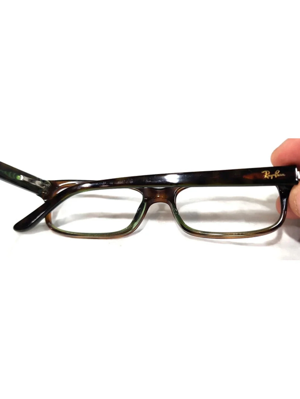 Ray-Ban **selling as